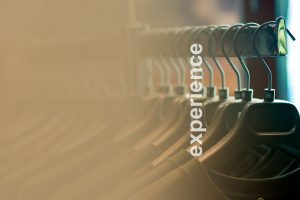 hangers with the overlay of the word experience