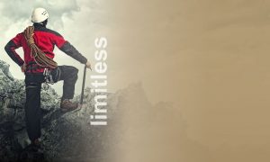 Man on a mountain in climbing gear with the overlay limitless