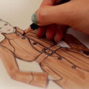 a women drawing a jacket