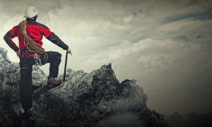 Man on a mountain in climbing gear