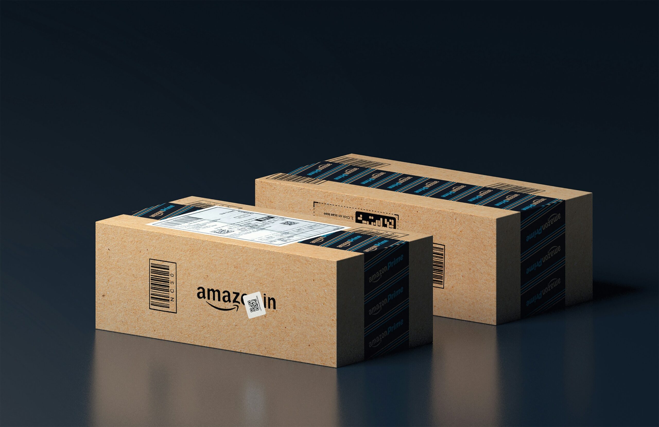 two Amazon Packages on a black background