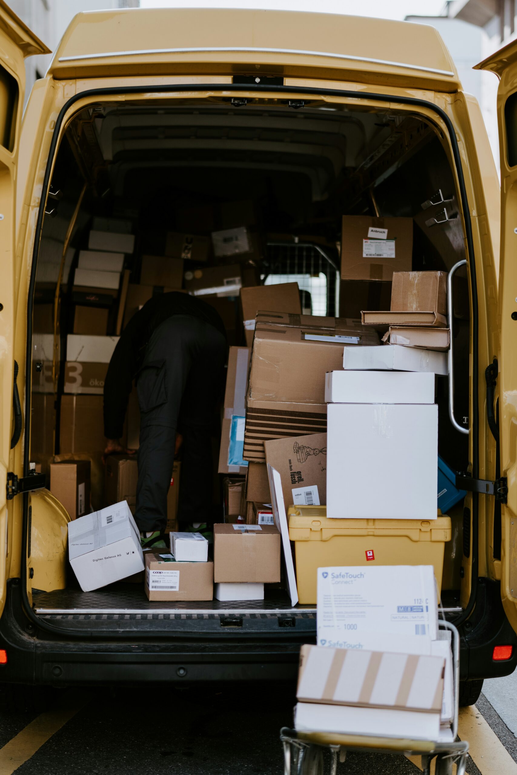 The back of a delivery truck with packages 