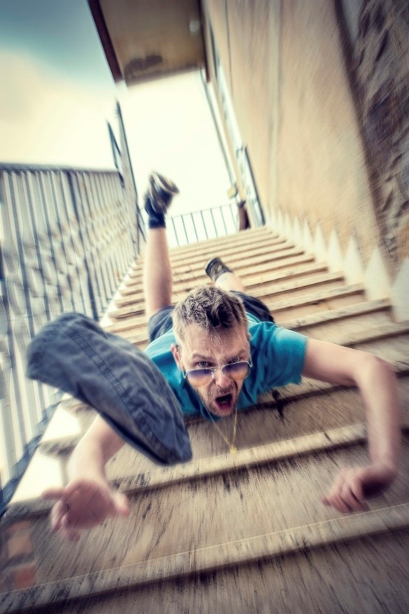 A man falling down stairs