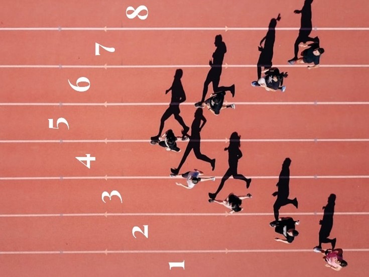 Runners on a track field