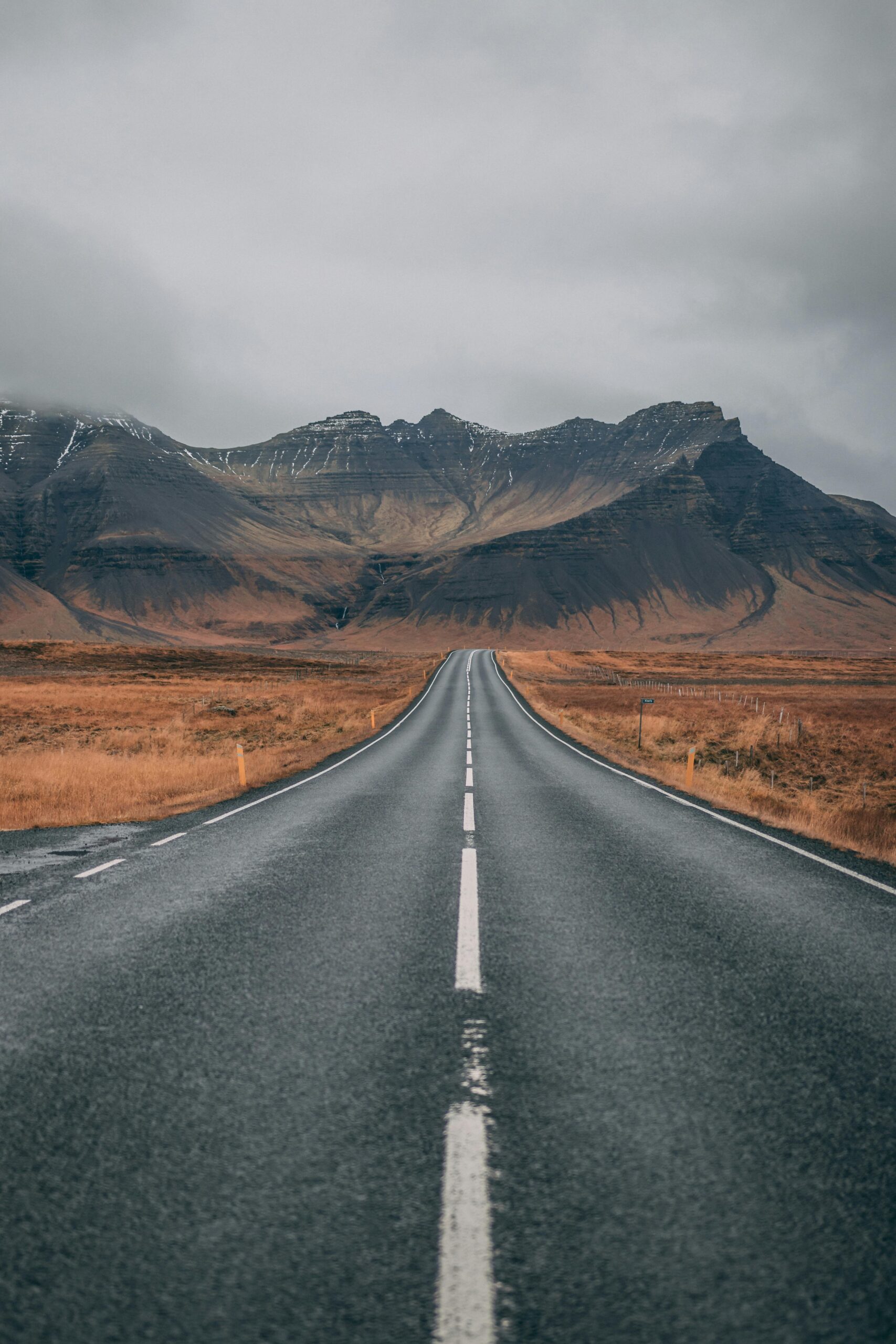 a long road going to the mountains 