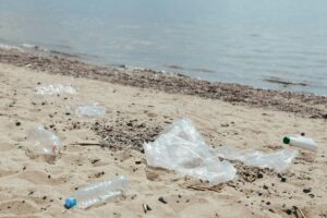 Trash on a beach by the ocean