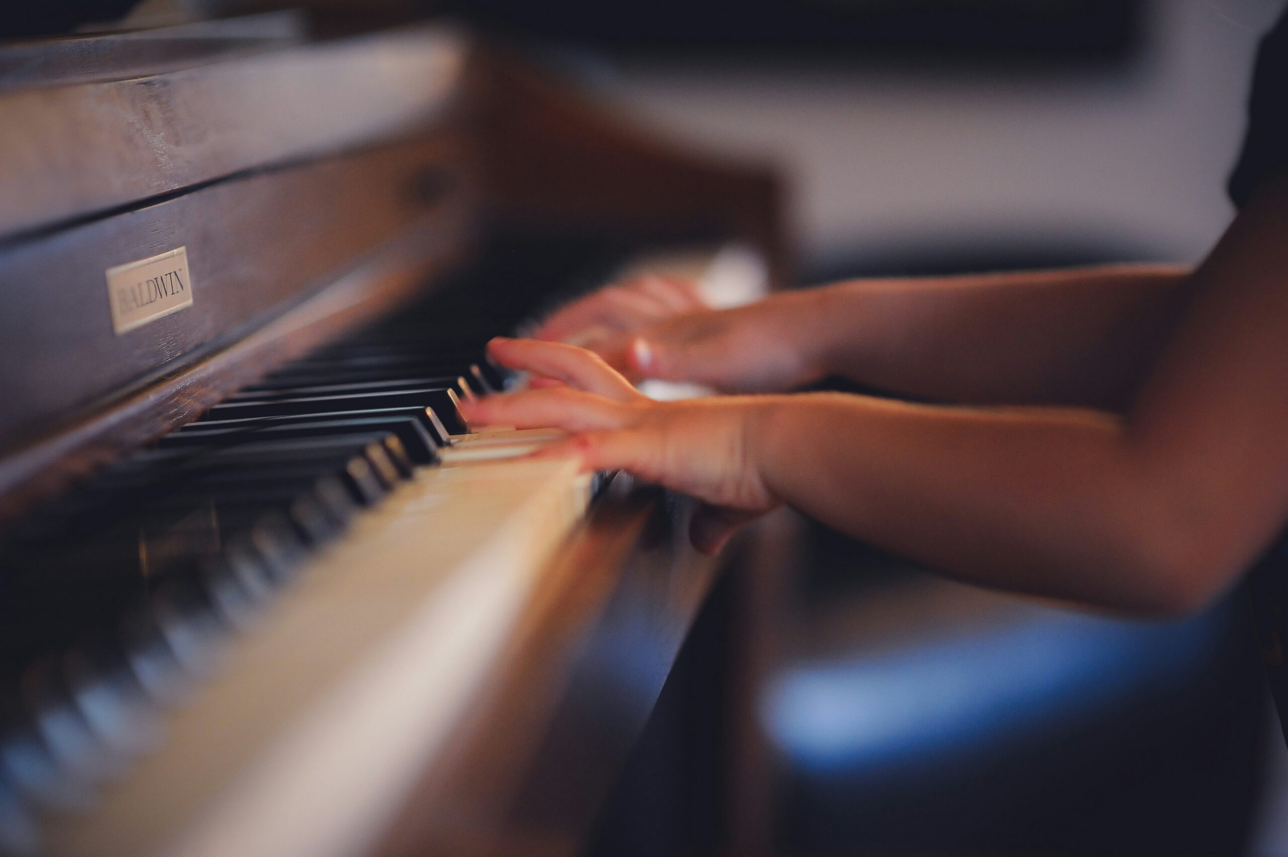 Someone is playing the piano 